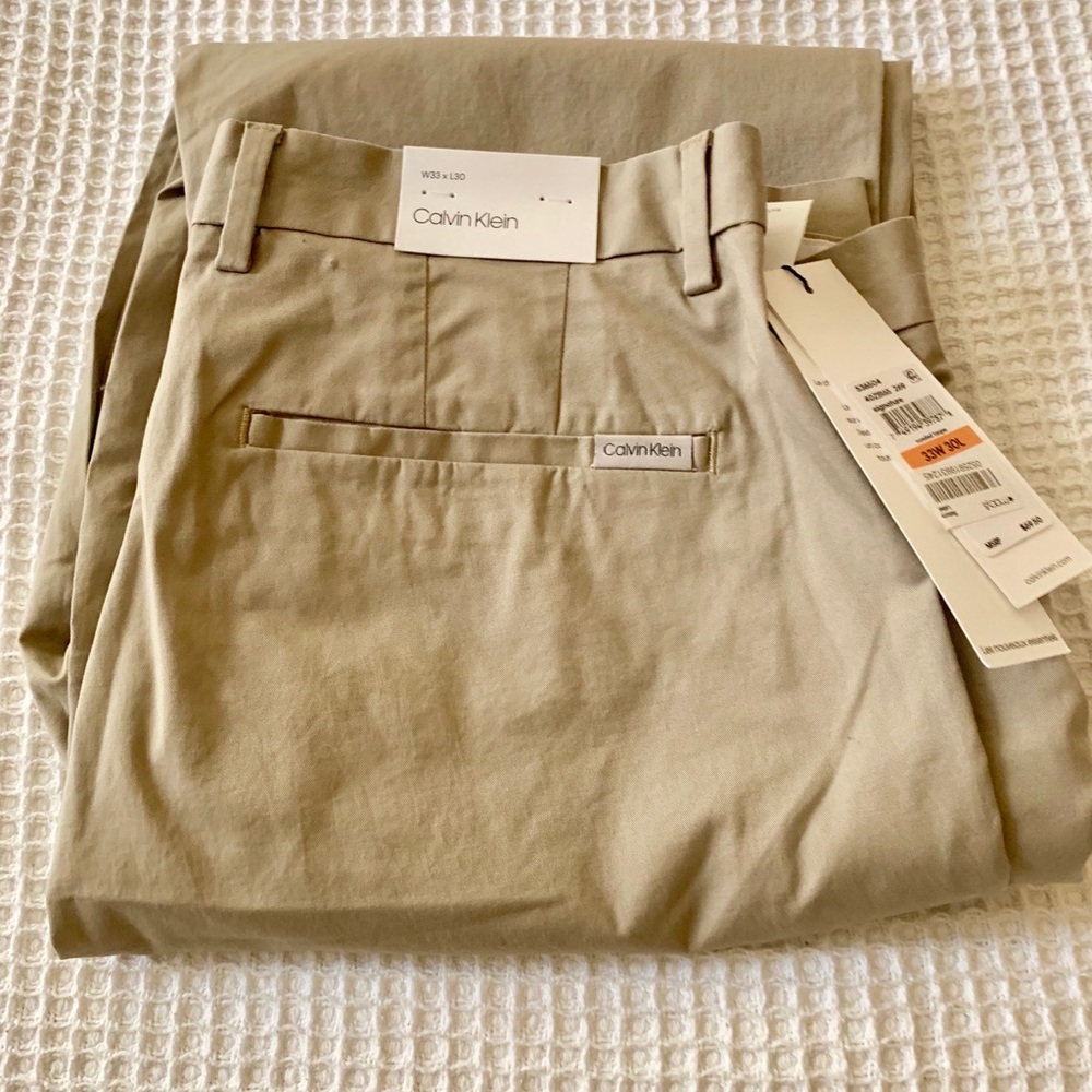 Brand New Calvin Klein CK Khaki dress pants. 33/30